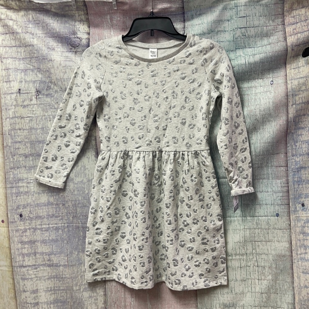 Brand new girls Carter’s dress. Size is 10-12.